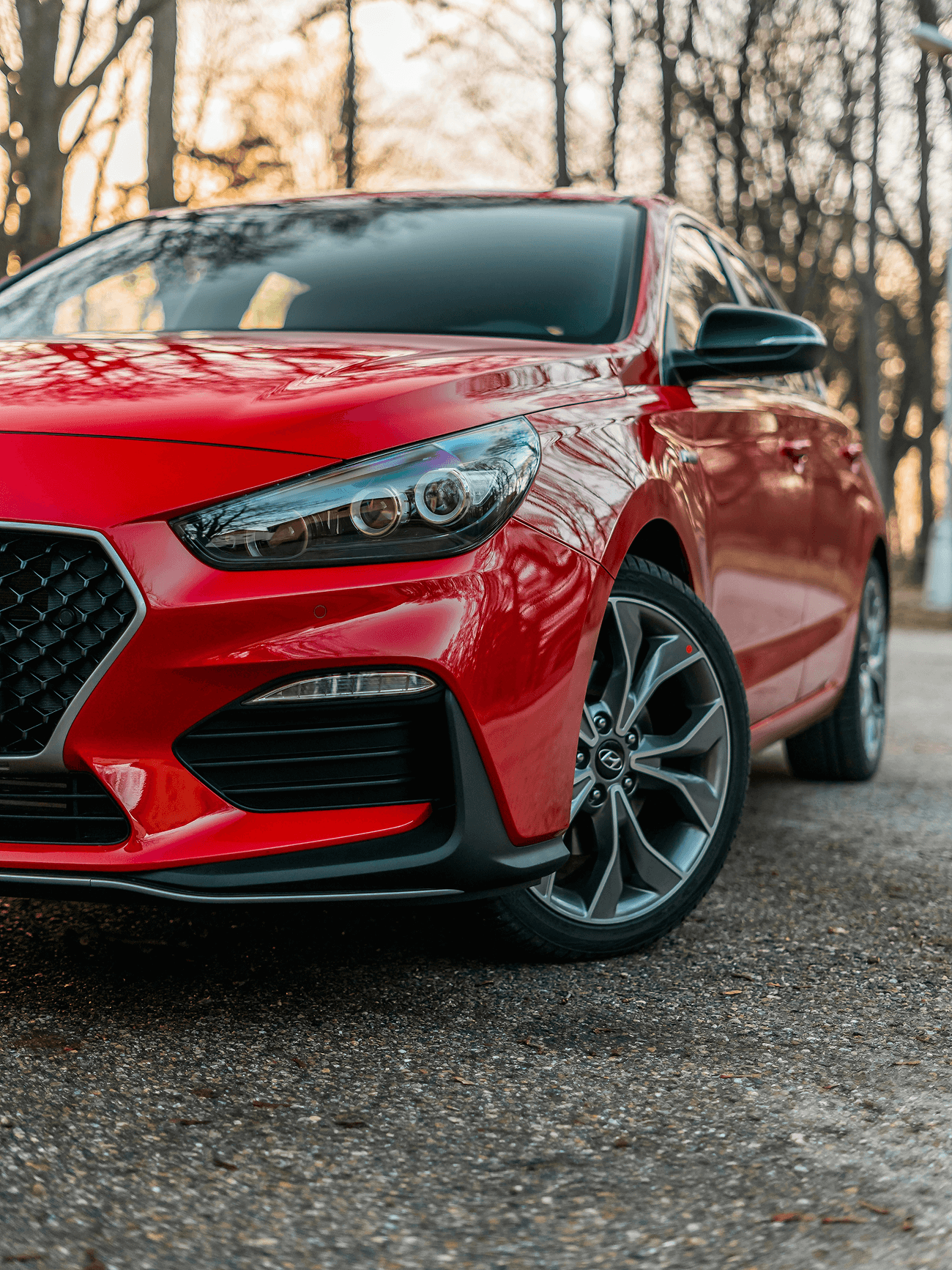 A red car parked outdoors