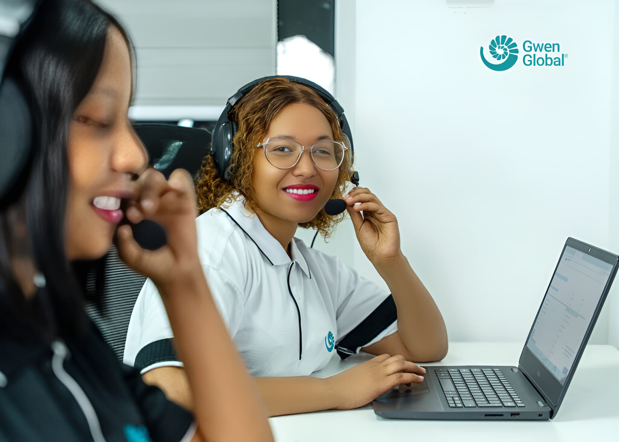 Gwen Global team members assisting clients by phone